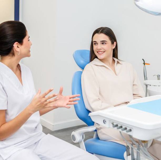 Dentist and patient during cosmetic consultation