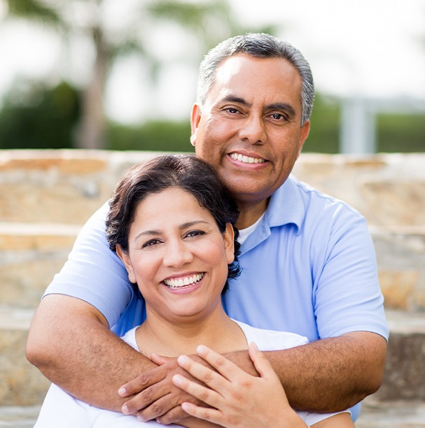 husband hugging wife