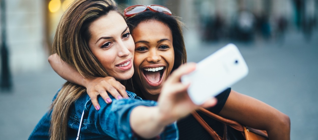 women taking selfie