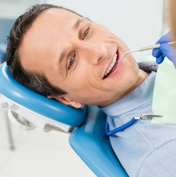 Man in dental chair for cosmetic consultation