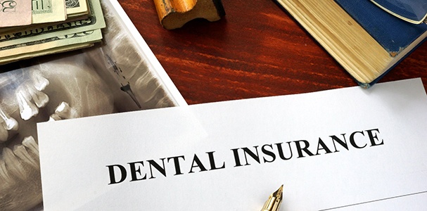 Dental insurance form on desk