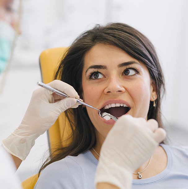 woman getting a dental checkup