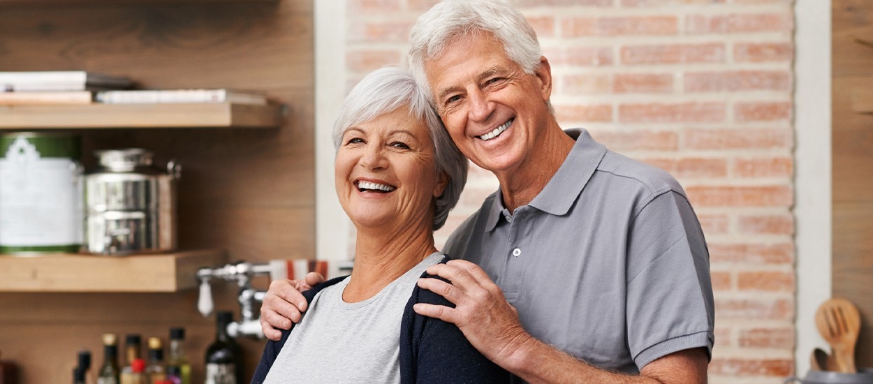 husband holding wifes shoulders