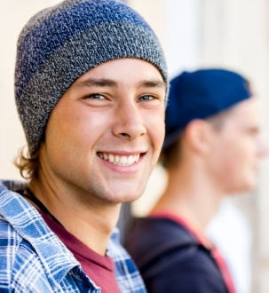 man with hat on smiling