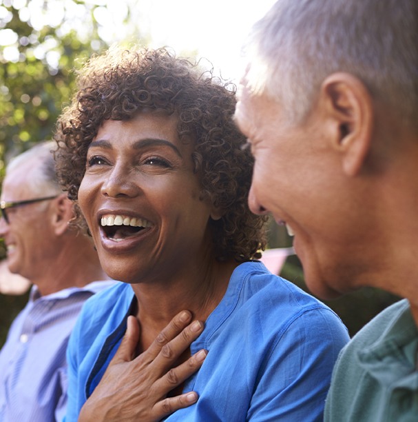 woman laughing with friends