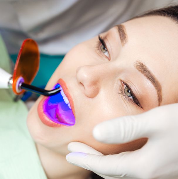 woman having tooth colored fillings placed