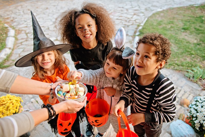 children trick-or-treating on Halloween