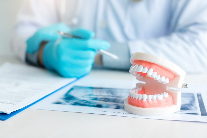 A closeup of white dentures on a table